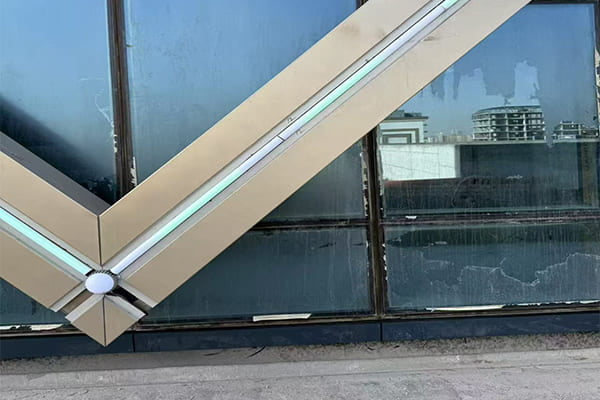 An up-close shot of a linear LED light fixture hidden within a window frame.